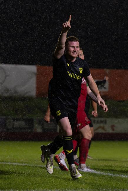 Lee Jenkins celebrates scoring the winner with a powerful trademark header for Haverfordwest County